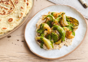 Baharat roasted cauliflower with a butterbean hummus and coriander dressing